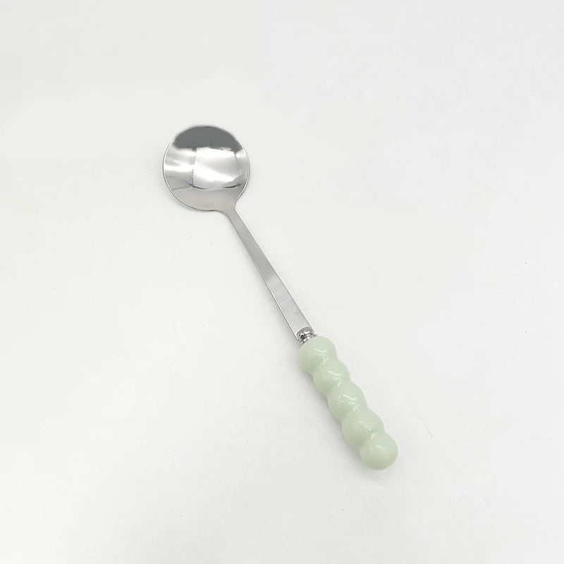 Alice-Cuillère design avec la poignée perlée en acier inoxydable finition dorée