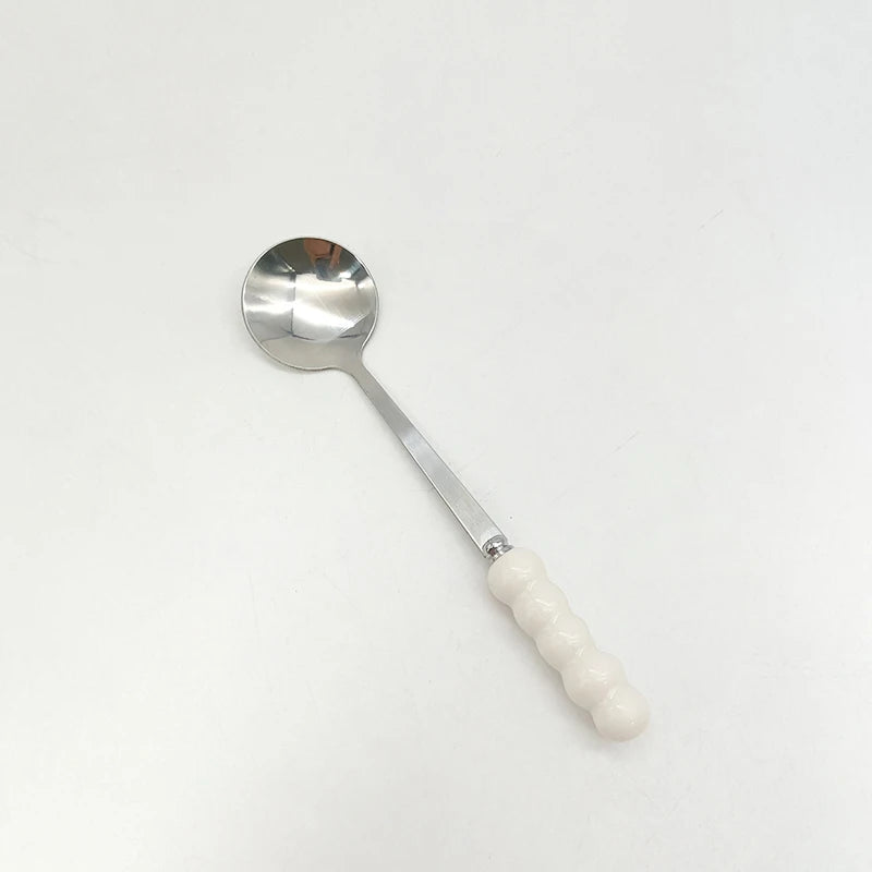 Alice-Cuillère design avec la poignée perlée en acier inoxydable finition dorée