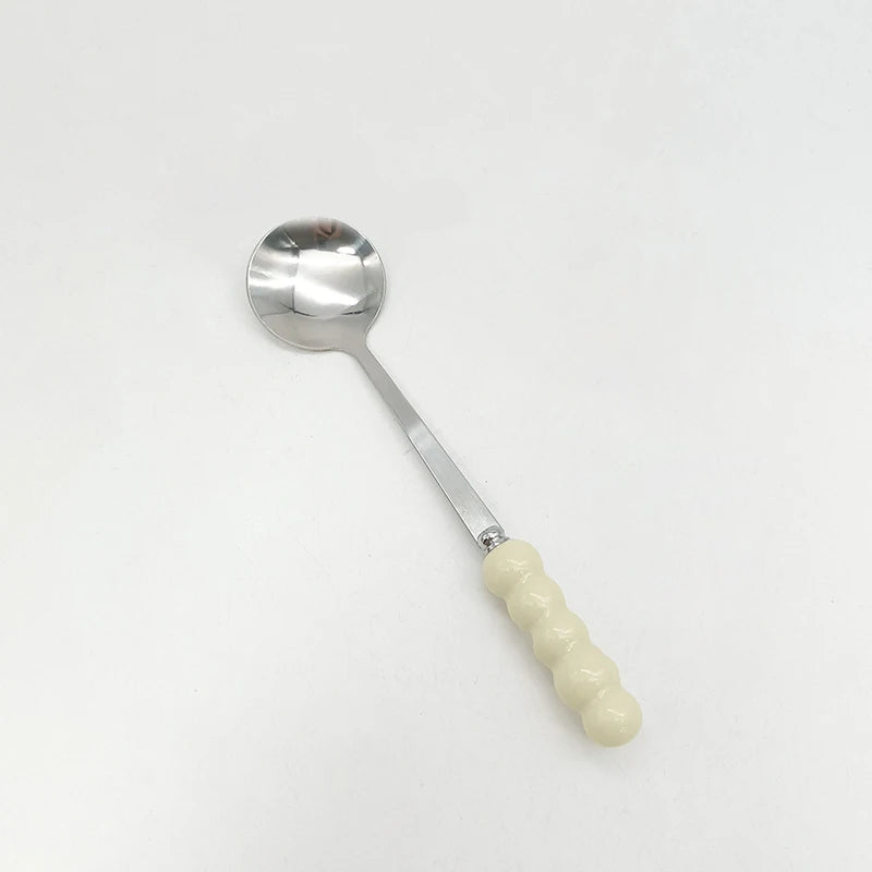 Alice-Cuillère design avec la poignée perlée en acier inoxydable finition dorée